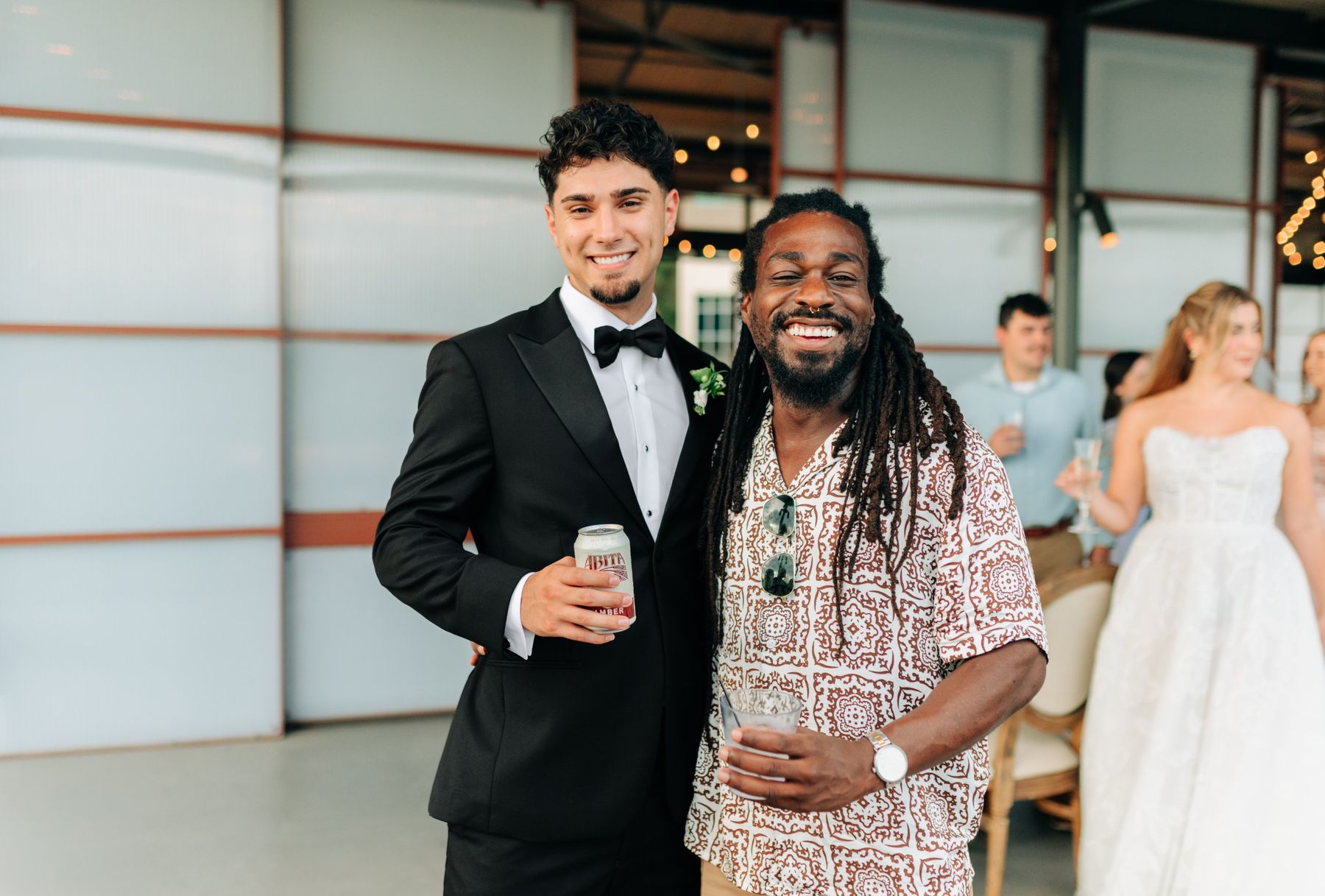 Moncus Park: groom laughing with a guest at the Doerle Pavilion